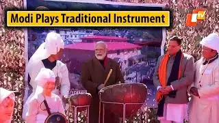 PM Modi Tries His Hands At A Traditional Musical Instrument In Uttarakhand