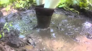 Rubber boots in mud
