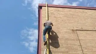 Nathan Drakeing my way up a pipe climb