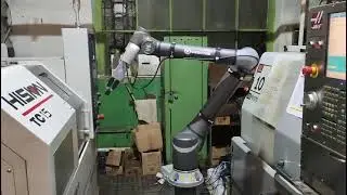 TM Robot обслуживает сразу два станка ЧПУ