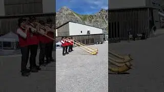 Альпийский рог. Музыканты в горах.  