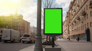 A Billboard With A Green Screen On A Busy Street 4k | By Creator Stockify