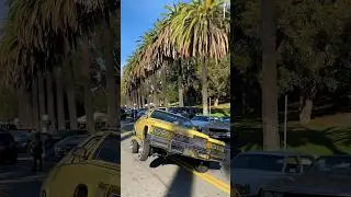 Cadillac Lowrider cruising in 3 wheel motion through Elysian Park, Los Angeles!