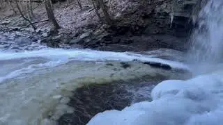 A waterfall in County Durham is pictured partially frozen after temperatures plummeted