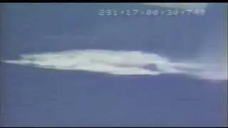 Space Shuttle SRB re-entry and splashdown in the ocean after launch