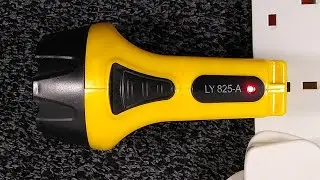 Taking apart Vince's Cambodian rechargeable flashlight