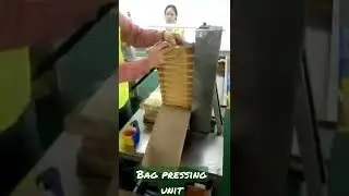 Paper bag pressing machine