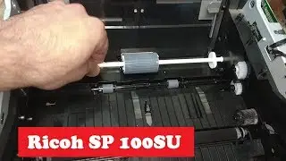 Ricoh SP 100SU does not take paper. Error E1. Disassembly