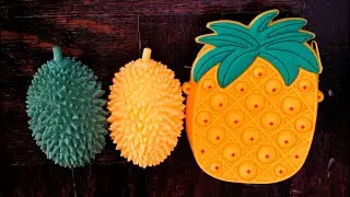 Fruits Pop it vs stress balls, Pop it bag fidget training