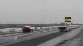 Two drag cars crash and roll over