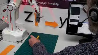 VOICE CONTROL of an ST Robotics robot arm.