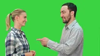 Handsome Man And Attractive Young Woman Talking And Smiling On A Green Screen Chrom 4k