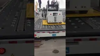 Демонстрация работы цепей на элеваторе погрузчика контейнеров и паллет производства компании TLD.