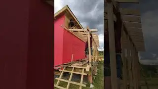 Installation of Rafters for The Entrance Group of a Frame House 