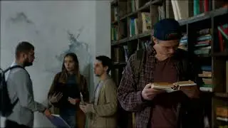 Boy reading a book in a library  | Free Stock Footage - No Copyright