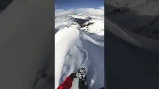 Snowboarding Down A Mountain