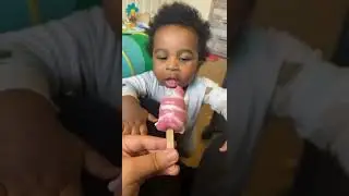 Baby tries sour popsicle for the first time...
