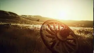 Old Wooden Wheel on the Hill at Sunset | Motion Graphics - Envato elements