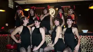 Burlesque Group Photo at the Bar at the Latin Groove's end of session party on November 8 2024