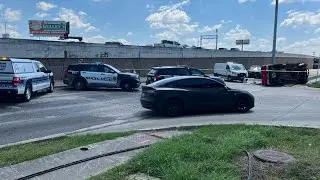 Man found dead with a gunshot wound to the chest inside crashed vehicle along the Southwest Freeway