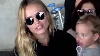 EXCLUSIVE:  Natasha Poly, kid and husband arriving at Nice airport for the 2015 Cannes festival