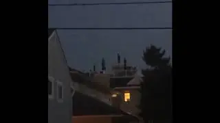man on roof dancing to where is my mind