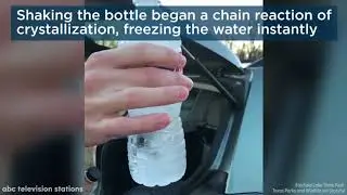 Park ranger demonstrates flash freezing a water bottle in frigid Texas