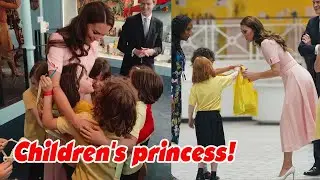 Princess Kate is surrounded by children as she takes them on a tour of the Young VA museum