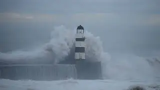 Huge waves crash against Seaham Pier, County Durham this morning - Storm Henk