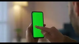 Man is using smartphone green screen