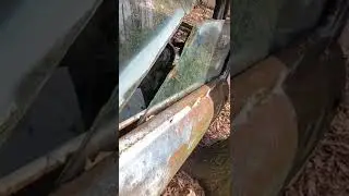 Broken window in 70 year old rustbucket car still works!