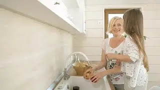 Daughter Kisses Mommy Stock Video