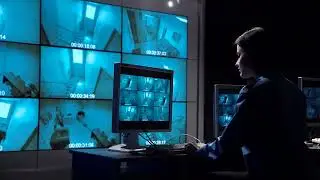 No Copyright A woman monitoring close circuit surveillance | Stock Footage Video