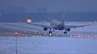 Dawn Sheremetyevo and airplanes in the light of thousands of electric lights. Russian winter, 2023