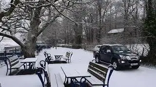 Heavy snow is pictured falling in the Cumbrian town of Keswick this morning.