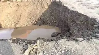 В Приморье раскопали дорогу, чтобы пустить паводковую воду