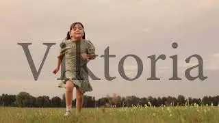 happy little girl runs across green field. cheerful child kid run jumping open air. daughter girl