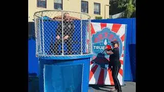 Police Chief Michel Moore goes in the dunk tank at The True Blue Gala at The LA Police Academy.