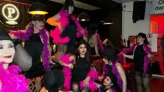 Burlesque Group Photo at the Bar (2) at the Latin Groove's end of session party on November 8 2024