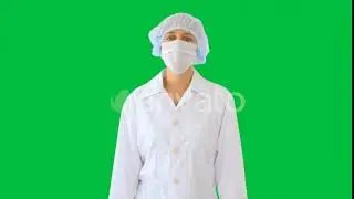 Walking Female Doctor Wearing Surgical Mask on a Green Screen, Chroma Key | Stock Footage - Vide...