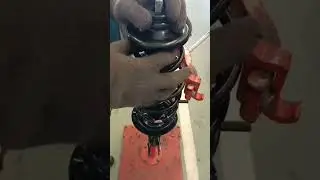 Change the front shock absorber 