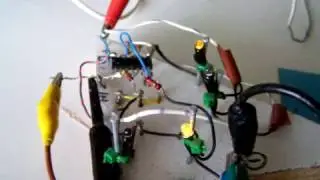 7400 logic chip drives LEDS but is also used as clock generator 2 Hertz (schematic)