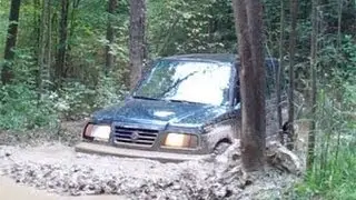 Suzuki Sidekick on muddy trails @ Southington Offroad, OH
