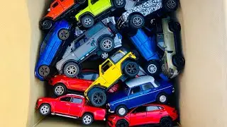 BOX FULL OF Diecast Cars - Jeep Wrangler, Jimny, Bronco, Jaguar, Mercedes Benz, Defender, Trucks,