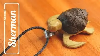 Turtle pendant from cypress cone and wood