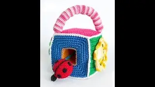 How to crochet a cube that develops. Knitted toy for children