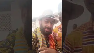 Wearing traditional Ghanian clothes at Friday prayers. Kumasi Ghana
