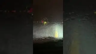 Heavy rain on a taxiway 