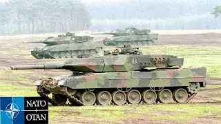Ukrainian troops train on Leopard 2 tanks in Poland
