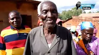 MWANAMKE AGAAGAA KWENYE VUMBI KISA KUIONA BARABARA YA CHANGARAWE